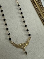 Vintage & Occasion Geelgouden 18 k collier met zwarte kraaltjes - lengte 45 cm