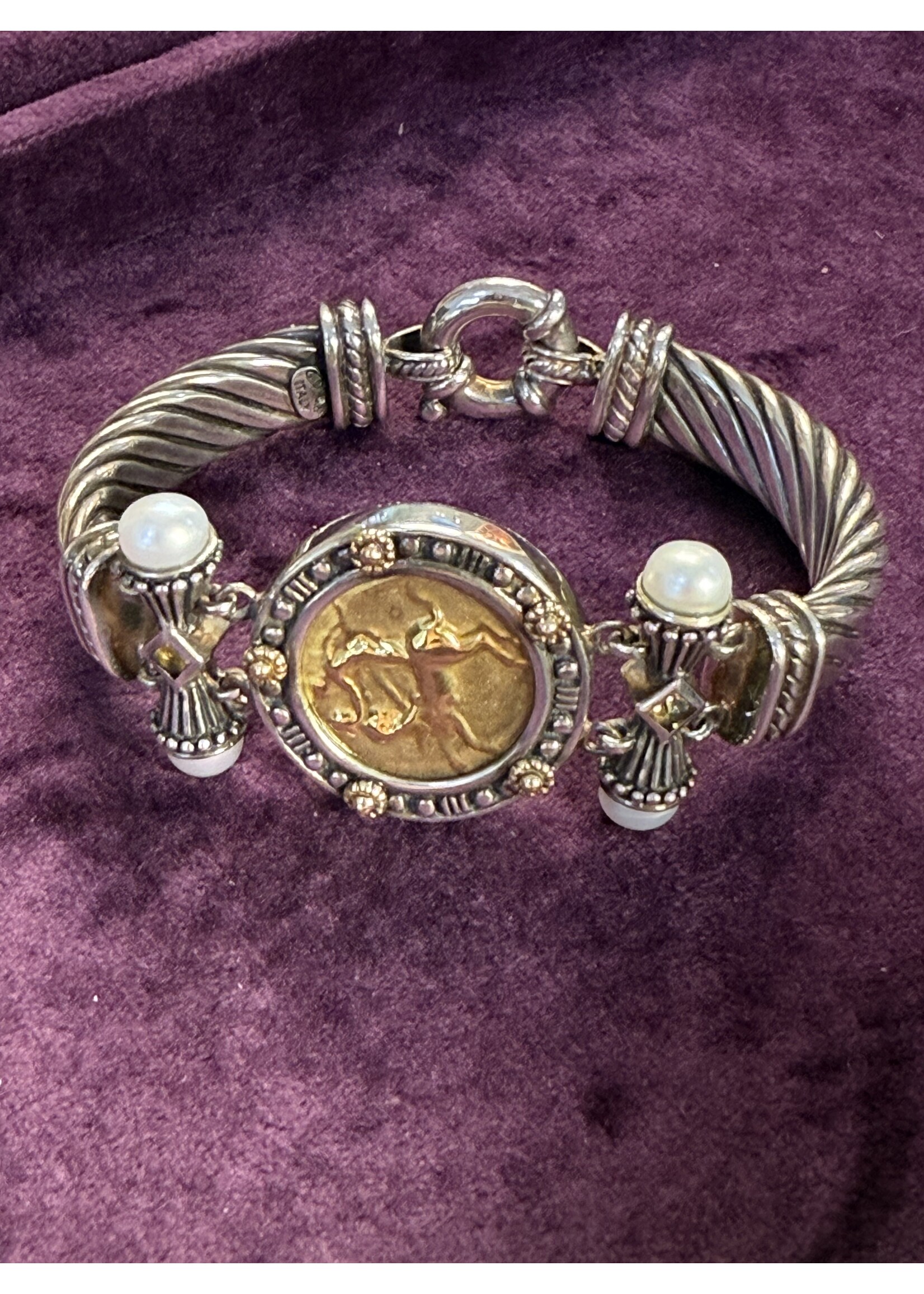 Zilveren armband met gouden munt