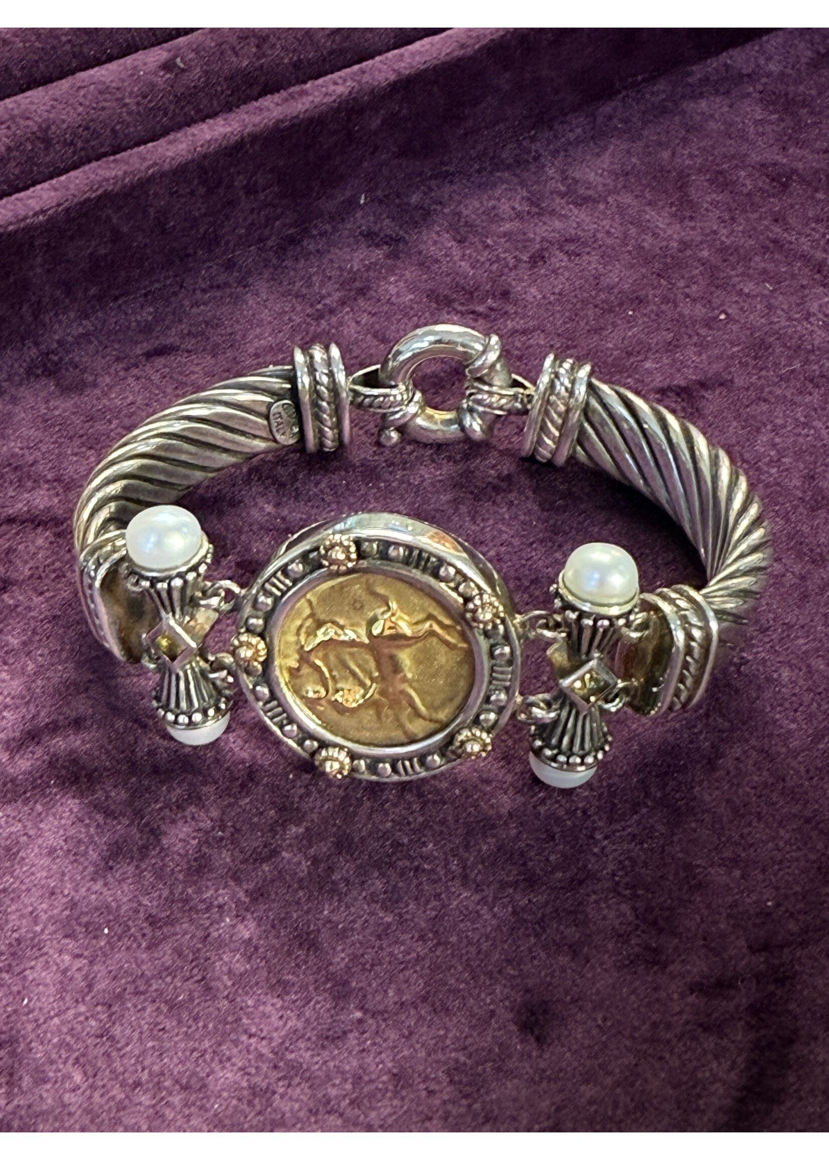 Zilveren armband met gouden munt