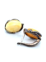 Vintage & Occasion Zilveren oorknoppen met barnsteen