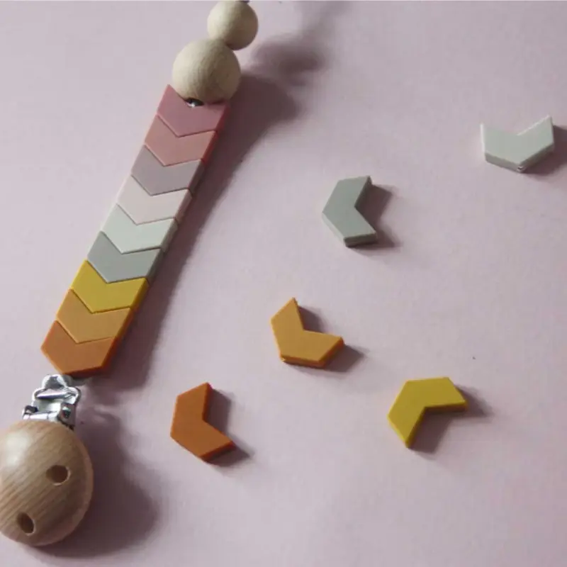 The Cotton Cloud Chevron Pacifier Holder Rose