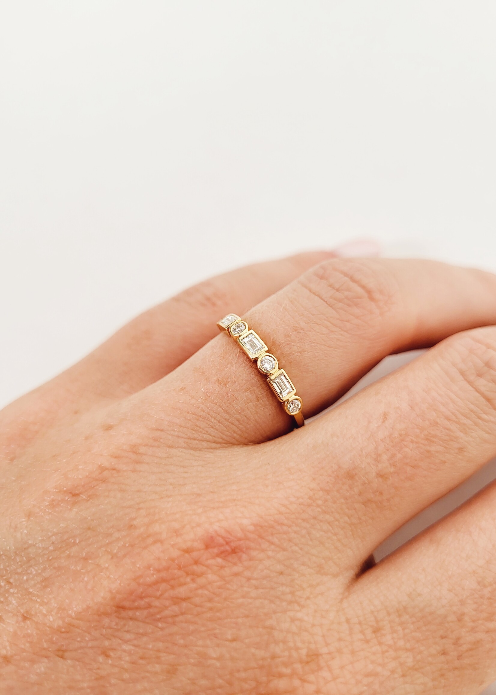 Ring met briljant en baguette diamanten