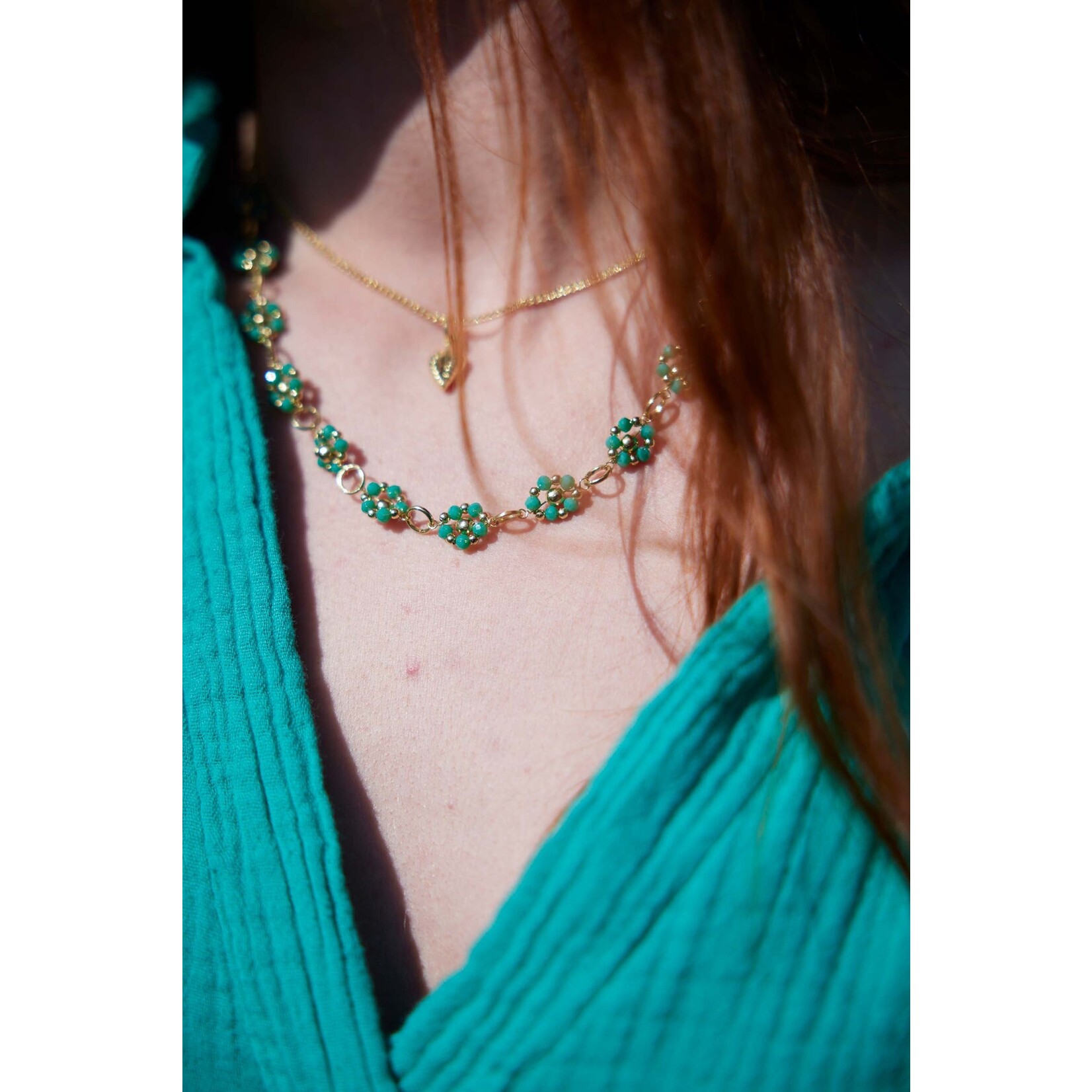 ZUSSS KETTING VAN KRAALBLOEMEN TURQUOISE