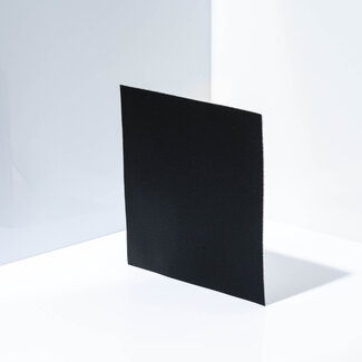 Schwarz kaschiertes Kunstleder