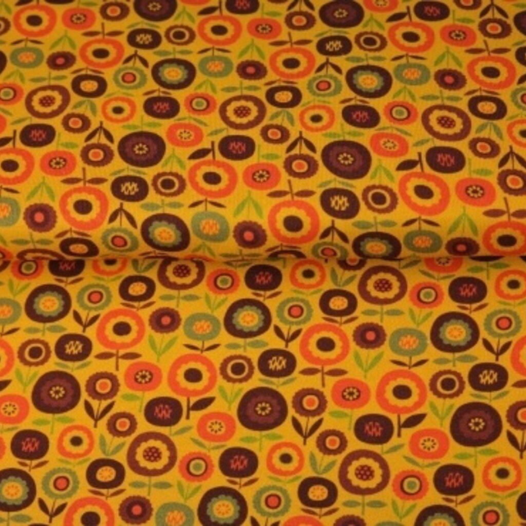 Retro oranje/geel bloem - Katoen tricot (16,00 p.m)