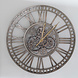 Lizzely Garden & Living Horloge murale Gill industrielle dorée à chiffres romains Lizzely Garden & Living Horloge murale Gill industrielle dorée à chiffres romains