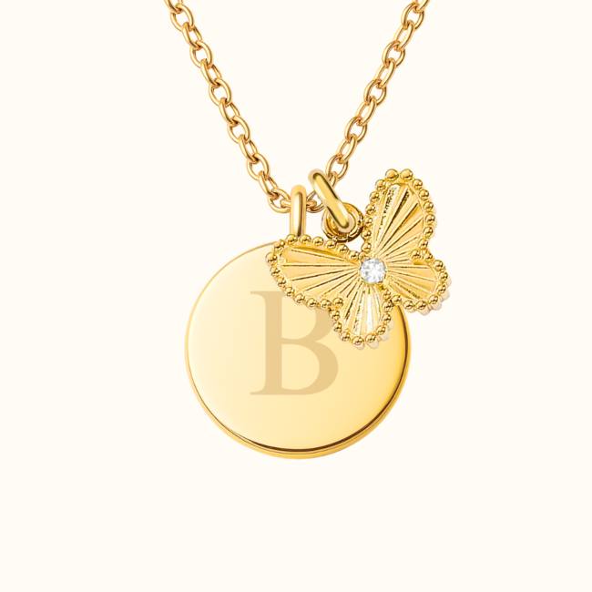 Coin ketting met vlinder bedel