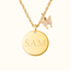 Coin ketting met klein vlinder bedeltje