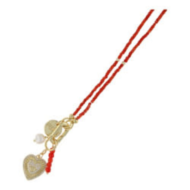 Fushi Fushi ketting halfedelsteen koraal oranje met clip en bedels