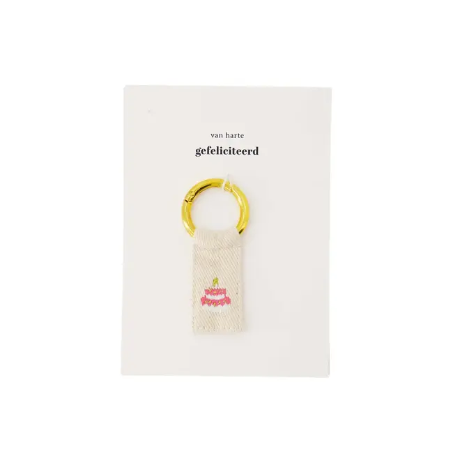 Zusss Zusss ansichtkaart sleutelhanger taart wit/roze