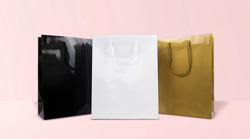 Luxe papieren tassen: welke soorten en handvatten passen bij jouw merk?