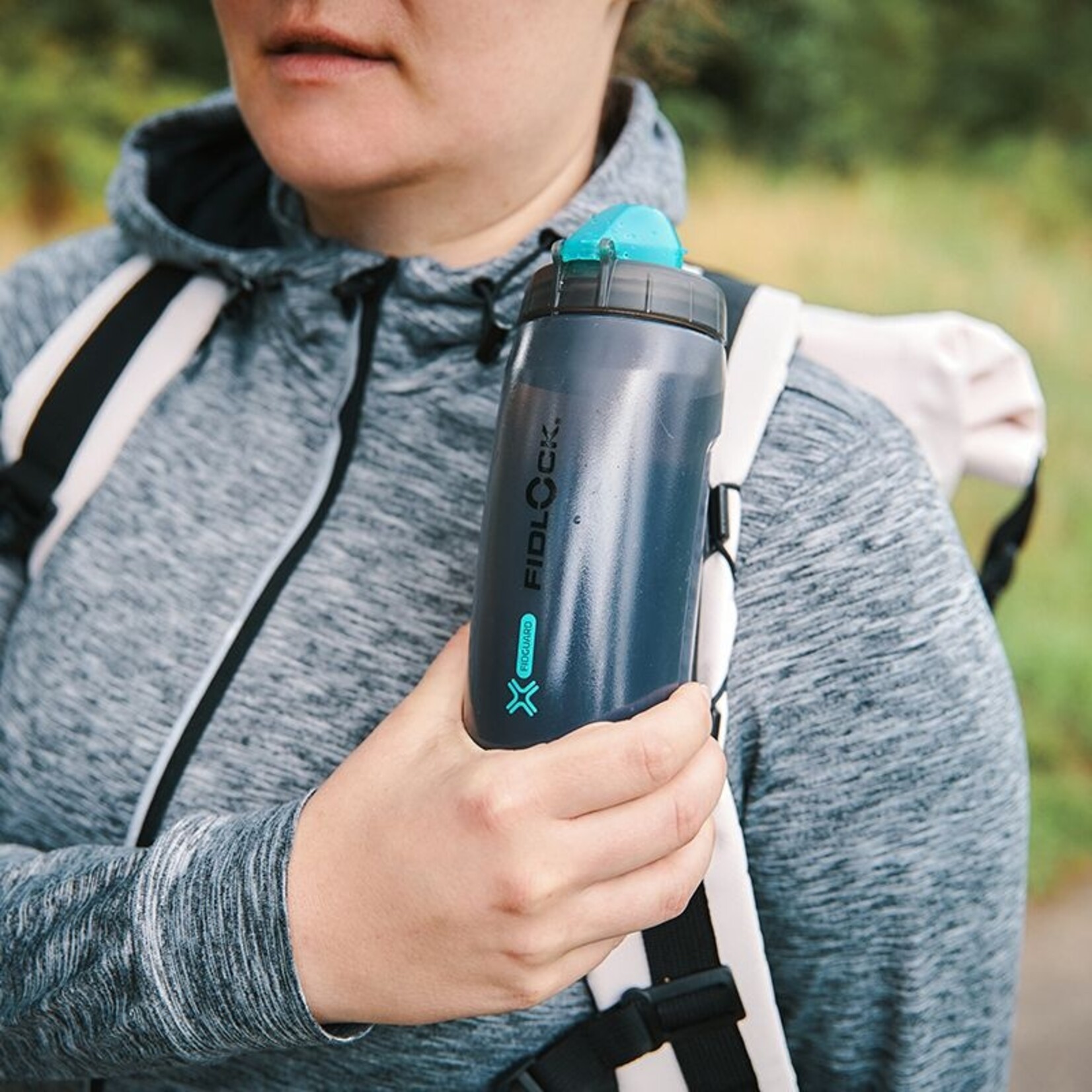 Fidlock MAGNETIC-MECHANICAL BOTTLE HOLDER FOR VERTICAL AND HORIZONTAL STRAPS