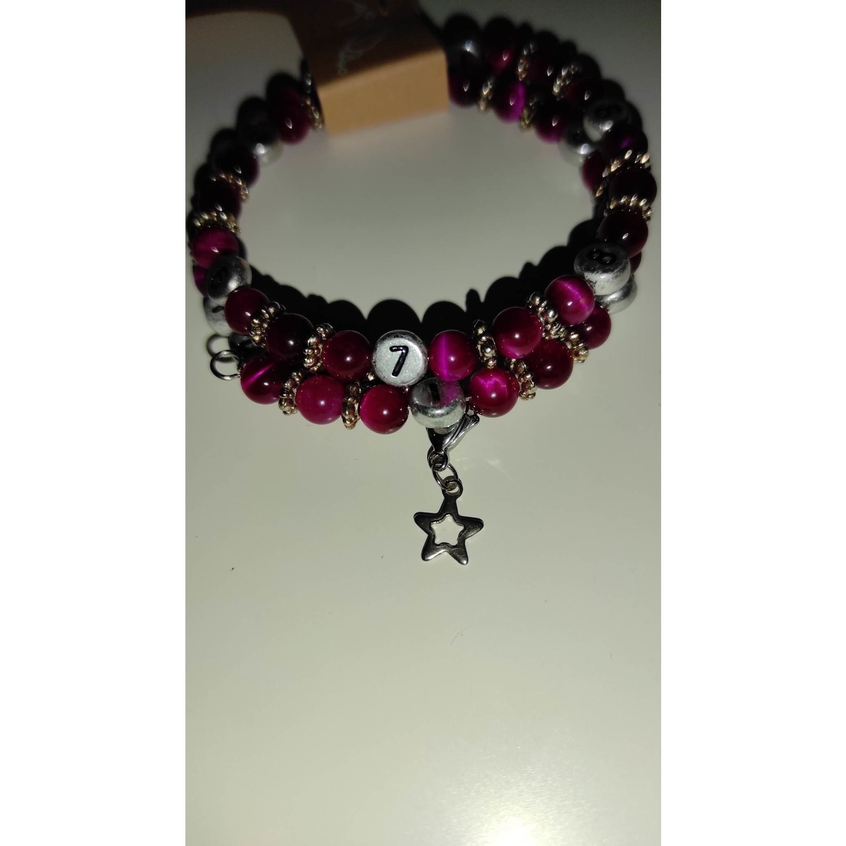 IRREVERSIBLE  Borstvoeding armband - roze getint tijgeroog