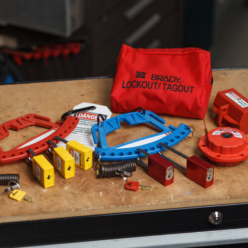 Lockout kits and lockout bags for safe machine maintenance