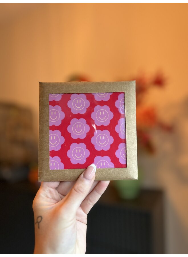 Tegeltje smiley bloemetjes