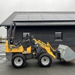 Mustang AL 106 wiellader 2008 met 2140 uren.