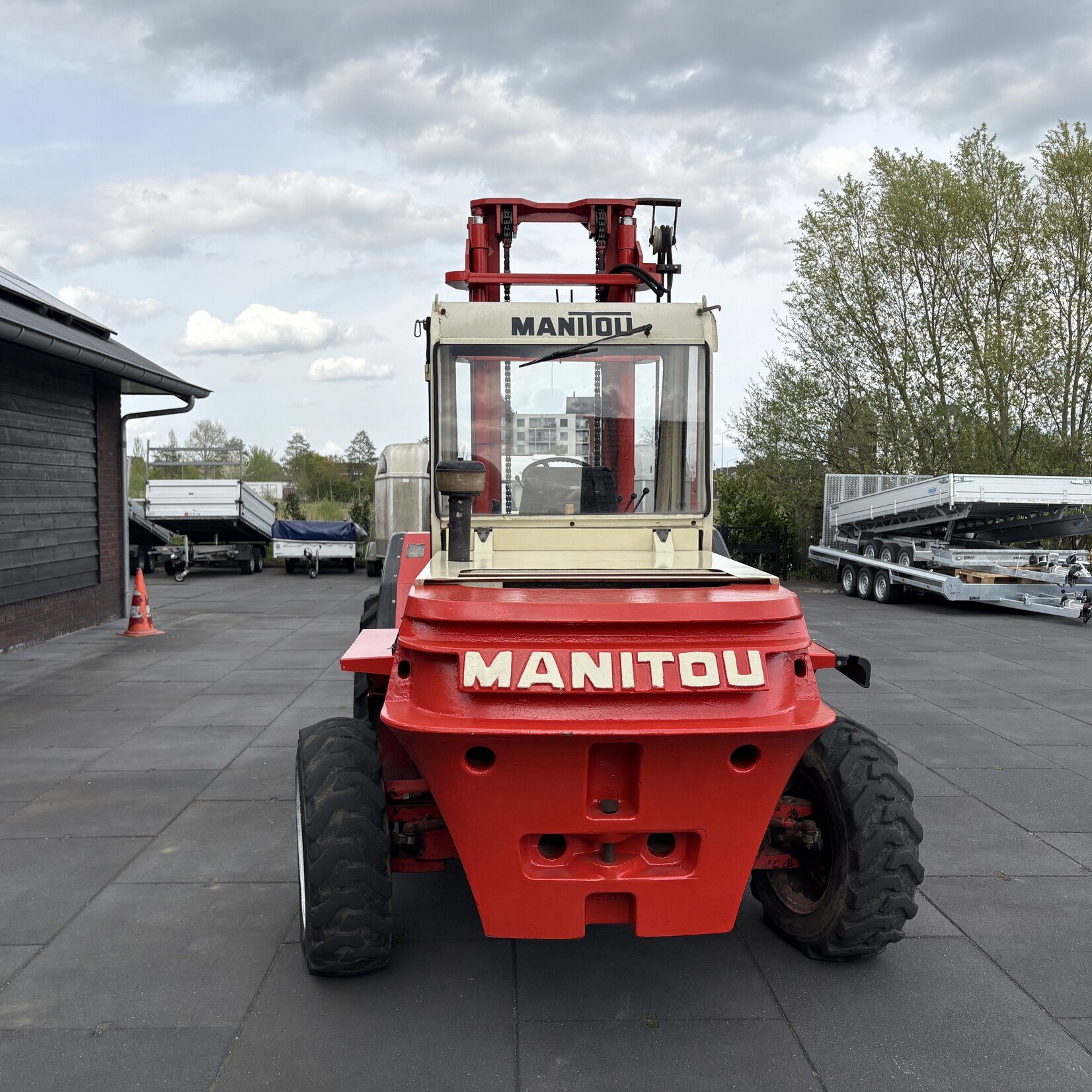 Manitou MC50CM Ruw terrein heftruck met cabine in goede staat
