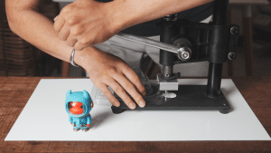Punch a hole in the top of the blister