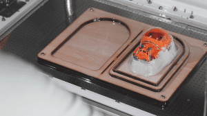Remove the mould from the vacuum former and trim excess material