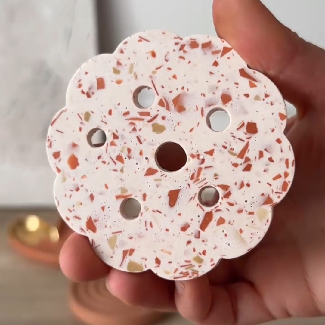 A copy of the terrazzo vase cover, made with our compact desktop vacuum former