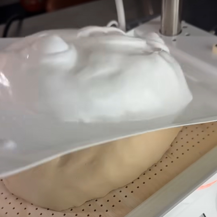 Removing the formed sheet from the mould