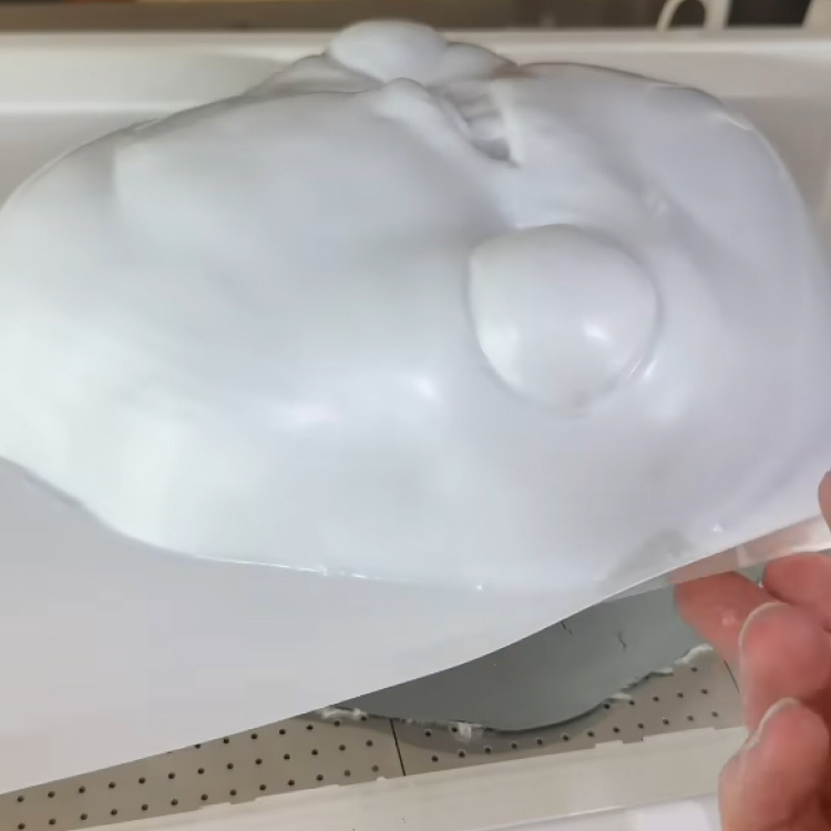 Vacuum forming the mask over the mould