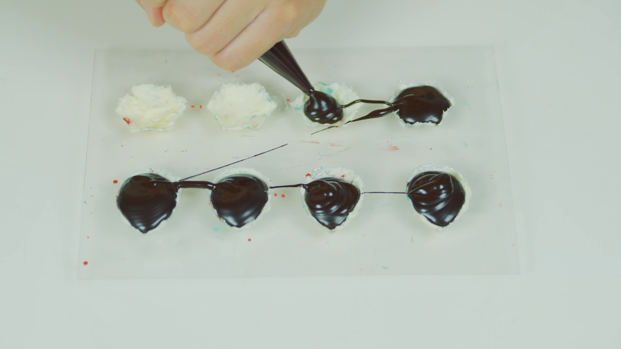 Pouring chocolate into the mould