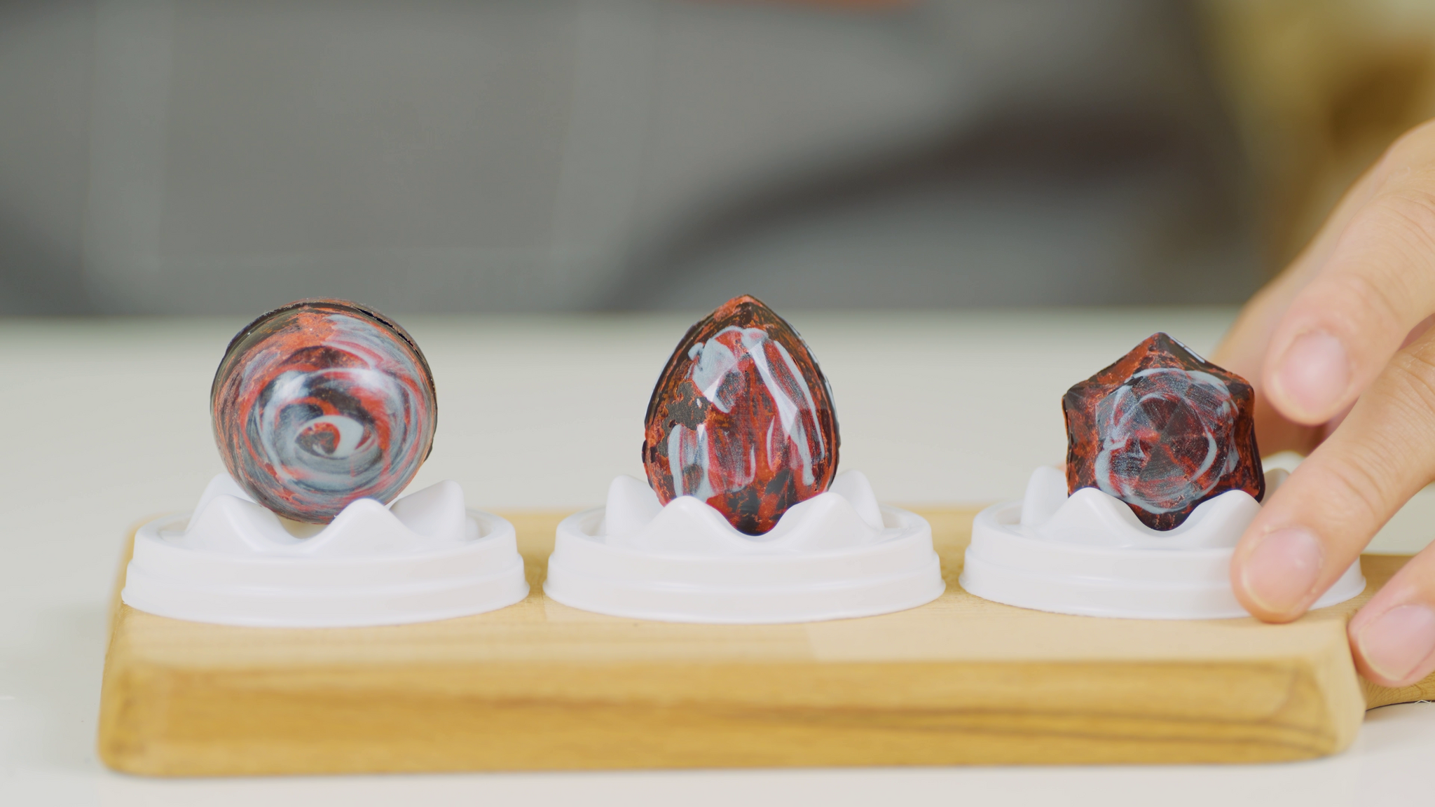 Three custom made chocolates in a row