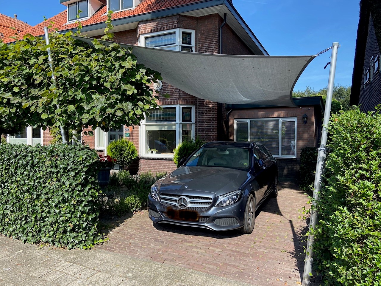 Bescherm je auto met een schaduwdoek