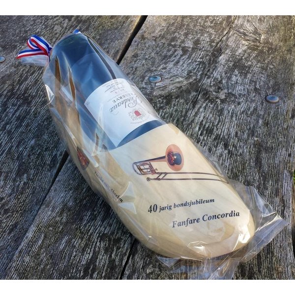 Clogs with a bottle of wine