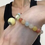 Parelarmbandje elastisch multi geel