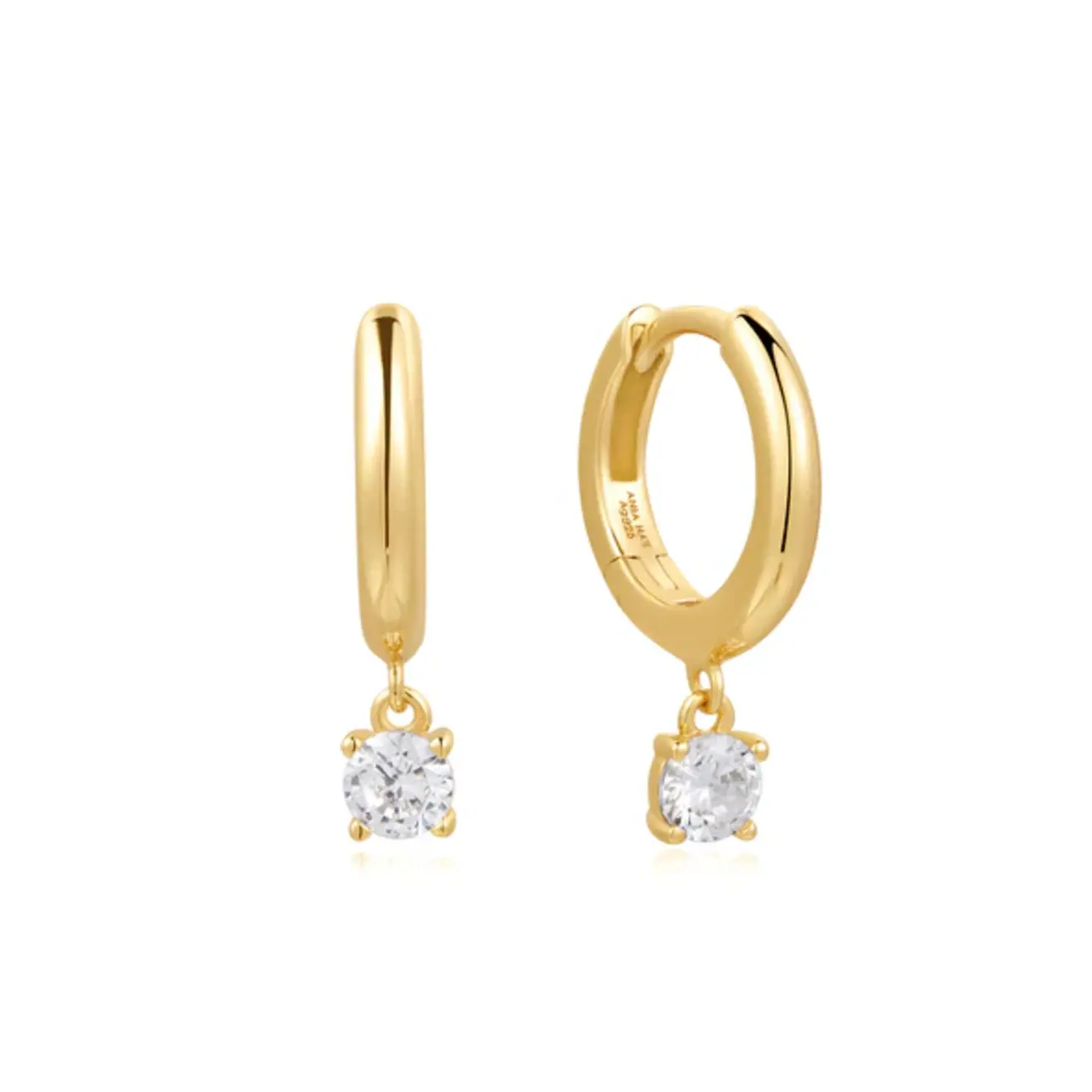 Solitaire huggies gold drop oorbellen