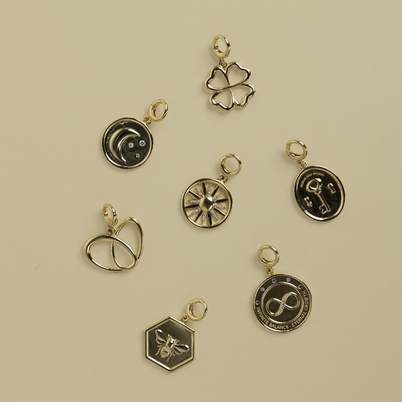 Clover charm voor ketting goud