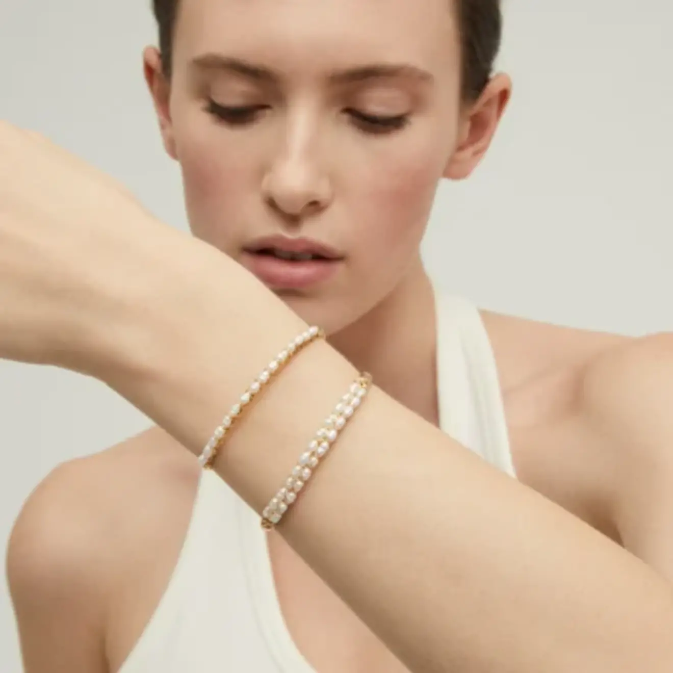 Lyre bange armband parel smal goud