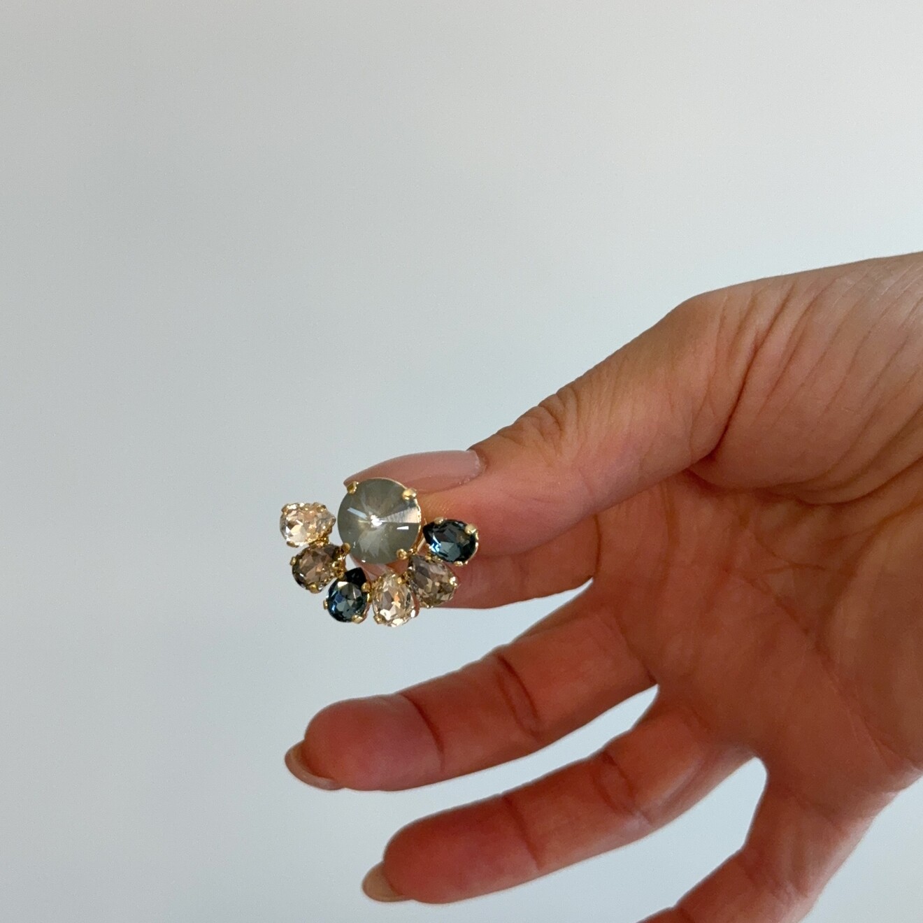 Inke halve bloem oorbellen mix blauw