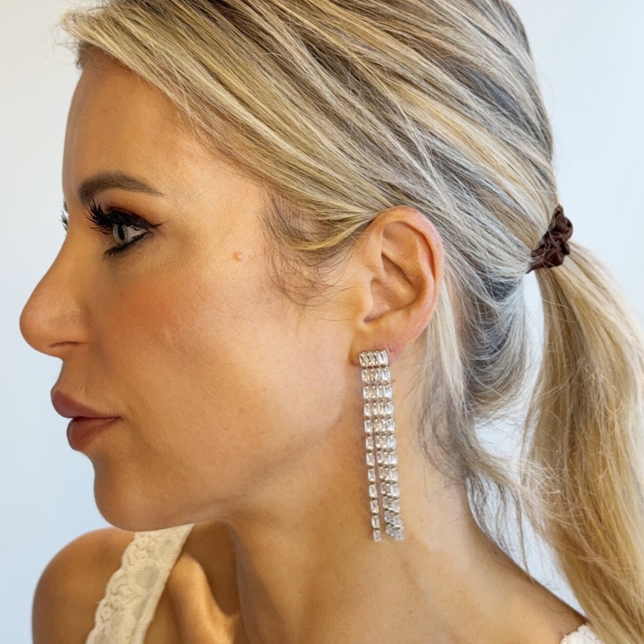 Tiny lange strass oorbellen zilver