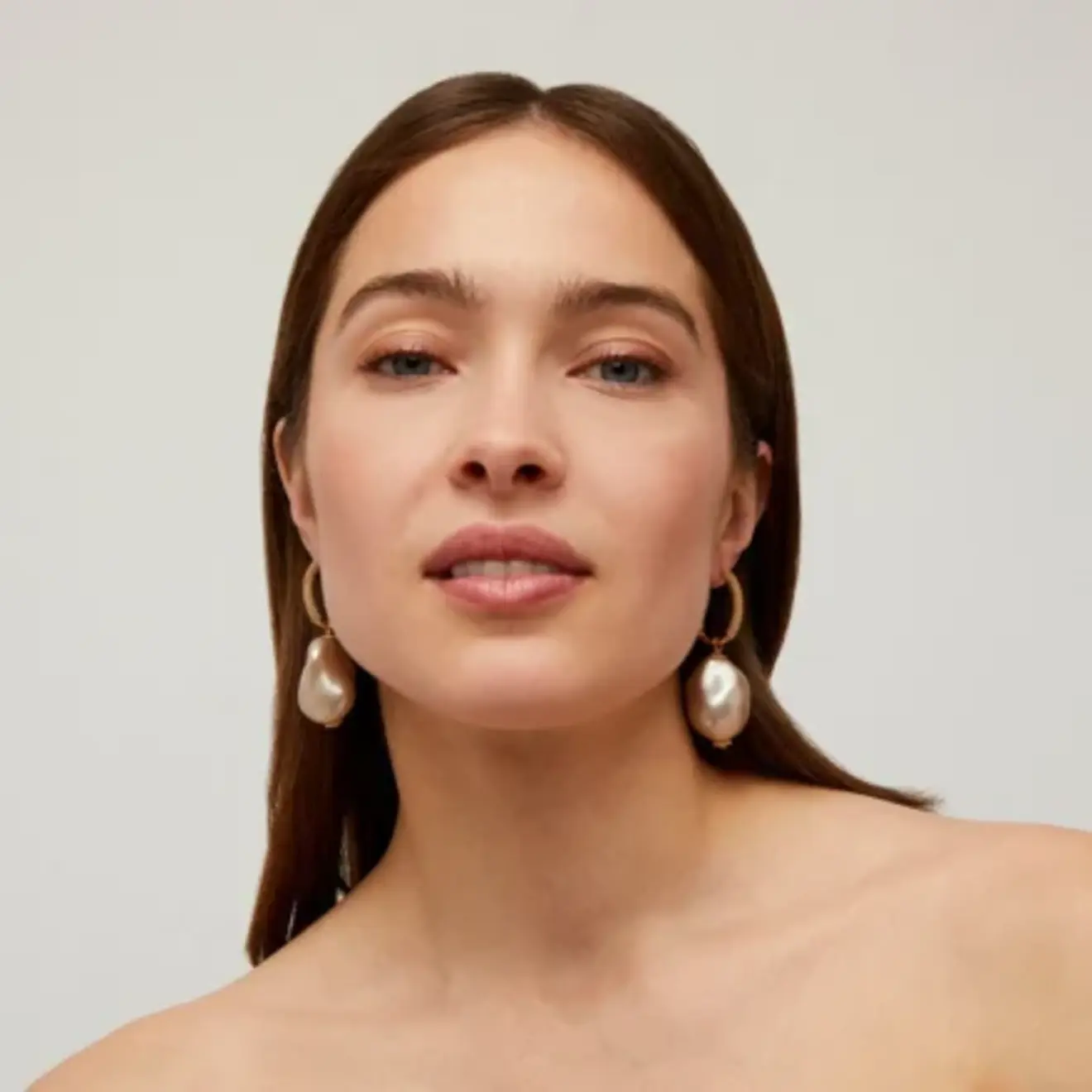 Miwa lyre oorbellen parel goud