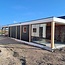 Maatwerk douglas schuur en overkapping met plat dak Blauwestad