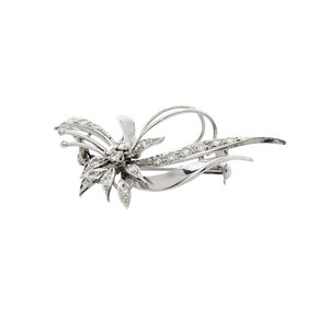 Gouden broche met 0.81crt. diamant 14 krt