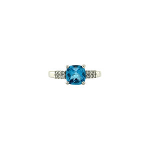 White gold ring with topaz and diamond 14 crt