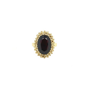 Gold ring with garnet 14 krt