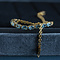 vintage Gold bracelet with topaz and diamond 18 krt