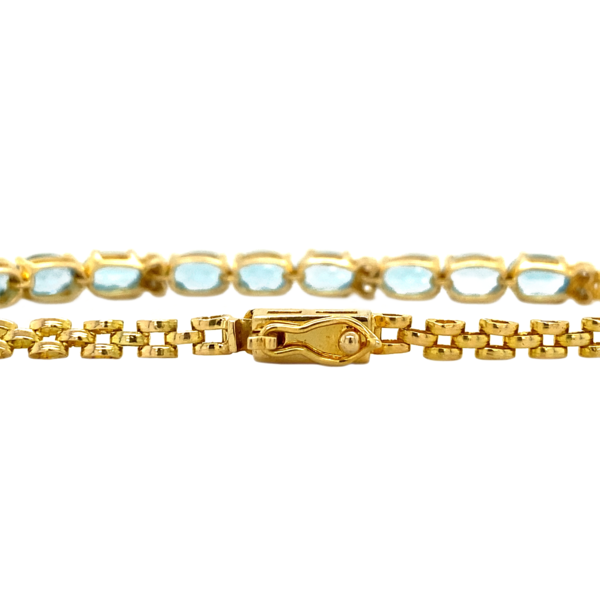 vintage Gold bracelet with topaz and diamond 18 krt