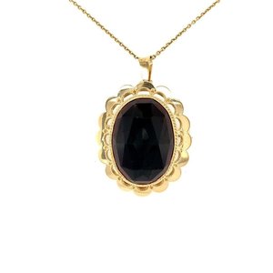 Gold pendant / brooch with garnet 14 krt