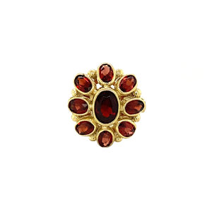 Gold entourage ring with garnet 14 krt