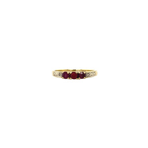 Gold ring with ruby and diamond 14 crt