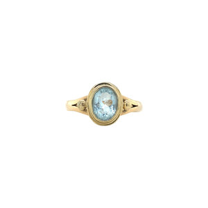 Gold ring with topaz 14 crt