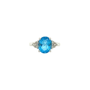 White gold ring with topaz and diamond 14 crt