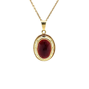 Gold pendant with garnet 14 krt