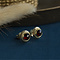 vintage Gold ear studs with garnet 14 krt